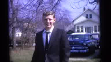 Camden New Jersey USA (1961): Woman Wearing Pink Suit Holds Hand Of Boy Wearing