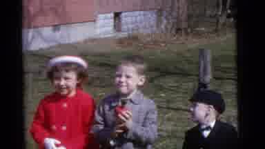 Camden New Jersey USA (1961): A Scene Of Three Children With Their Mother Standing