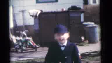 Camden New Jersey USA (1961): Young Boy Child Hat Happy Yard Walking Smiling