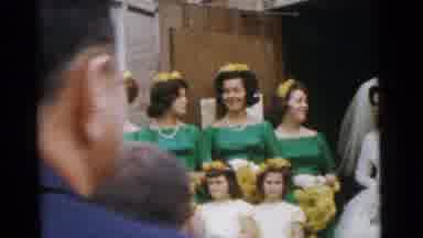 Camden New Jersey USA (1961): Four Women In Green Dresses Stand To The Side As A