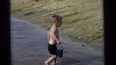 Camden New Jersey USA (1961): Young Kid On A Family Vacation At The Beach Having A