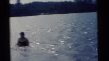 Camden New Jersey USA (1961): Adults And Children Wading In A Lake On A Sunny Day