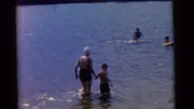 Camden New Jersey USA (1961): A Small Boy Taking Practice In The Sea With The Help