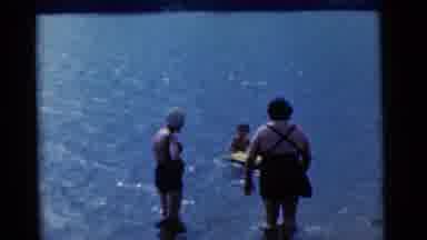 Camden New Jersey USA (1961): Family Swimming Together On A Sunny Day In Calm
