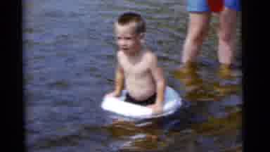 Camden New Jersey USA (1961): The Little Boy Is Bathing In The Pond And The Father