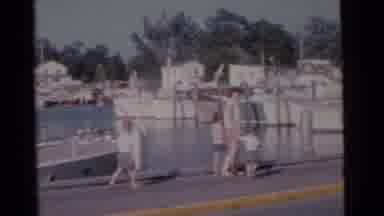Camden New Jersey USA (1961): Mother And 3 Children Walking By Boats