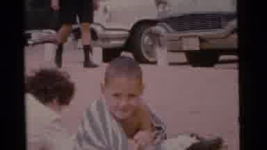 Camden New Jersey USA (1961): Three Boys Sit Around Playing With A Lone Girl In A