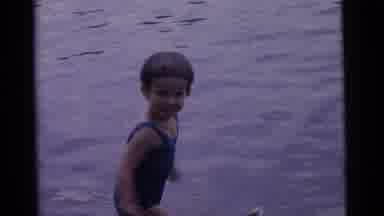 Camden New Jersey USA (1961): The Little Boy Is Walking In The Water Another Boy