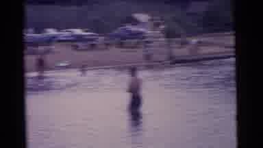 Camden New Jersey USA (1961): People Are Moving About In A Lake There Are Vehicles
