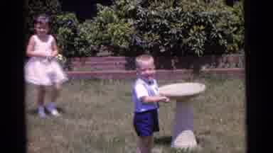 Camden New Jersey USA (1961): Little Girl Walks Up To Little Boy Who Is Looking At