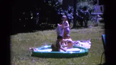 Camden New Jersey USA (1961): Children Play Very Excited In An Inflatable Pool