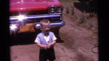 Camden New Jersey USA (1961): Children Playing In Front Of A Car On A Dirt Road