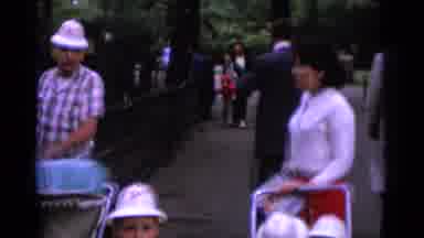 Camden New Jersey USA (1961): Woman Wearing Red Pants Pushes Stroller With Twins