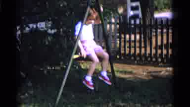 Camden New Jersey USA (1961): A Little Girl Doing A Backflip On Top Of Swing Set