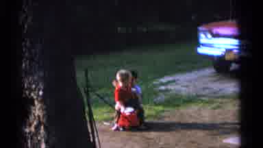 Camden New Jersey USA (1961): Two Boys Playing On A Toy Car With A Bit Of Shoving