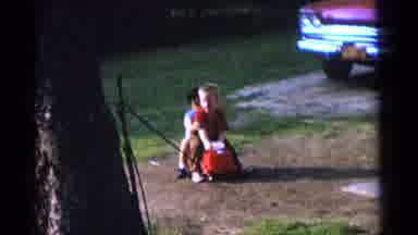 Camden New Jersey USA (1961): Two Kids Riding A Toy And The Back Child Hits And