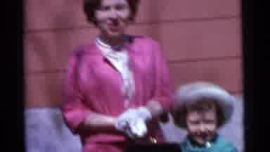 Camden New Jersey USA (1961): Young Family Preparing For Special Occasion Wearing