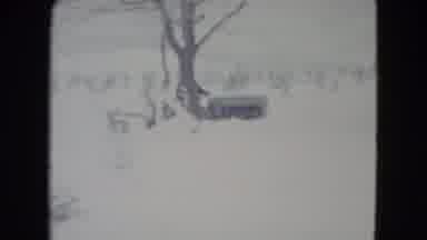 Madison Wisconsin USA (1960): A Man Is Driving A Truck Through The Snow On The