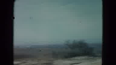 Nevada USA (1960): Driving Down A Countryside Road Empty Of Many Cars Except One
