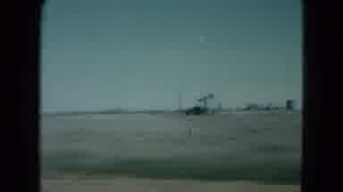 Nevada USA (1960): Driving In The Countryside With Little Scenery Just Clear Blue