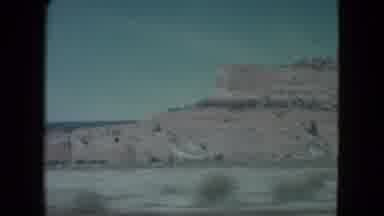 Nevada USA (1960): A Person Driving Down A Road And Getting A Great View Of A