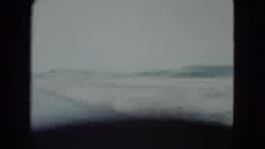 Nevada USA (1960): A Vast Land On A Sunny Day And Some Vehicles Moving Through The