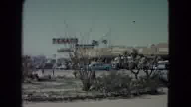 Nevada USA (1960): Car Driving Through A Town
