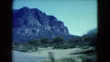 Nevada USA (1960): View From Inside The Car Of A Desert Road And Men Looking At A