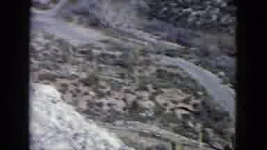 Nevada USA (1960): View Of The Rocky And Dry Desert With An Empty Road From A