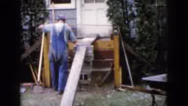 Wauconda Illinois USA (1960): The Workman Helps To Build A Porch Time To Get Some