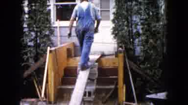 Wauconda Illinois USA (1960): Home Video Of Elder Man Doing House Work On Stairs