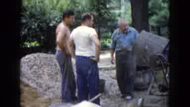 Wauconda Illinois USA (1960): Two Young Men And One Older Man Working With A