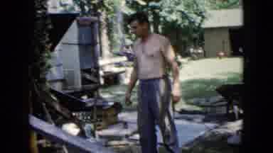 Wauconda Illinois USA (1960): Men Working With Wheelbarrow