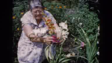 Wauconda Illinois USA (1960): One Lady Holds The Flower In His Hand And See