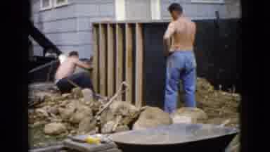 Wauconda Illinois USA (1960): Two Men Building A Wooden Structure In Yard