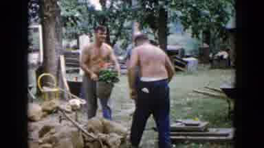 Wauconda Illinois USA (1960): Two Shirtless Men Working And One Man With A Shirt