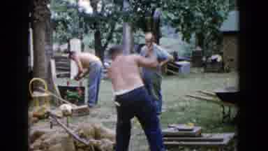 WAUCONDA ILLINOIS USA-1960: Men Cutting Stone By Hand In Backyard