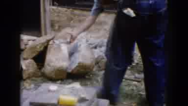 Wauconda Illinois USA (1960): Rock Pile Bend Pull Hand Examine Show Dusty Denim