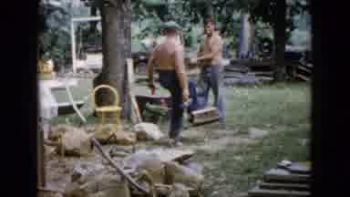 Wauconda Illinois USA (1960): Two Guys Cutting Wood