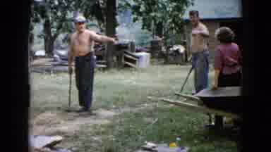 Wauconda Illinois USA (1960): A Man Passing A Beverage To A Woman Before Swinging
