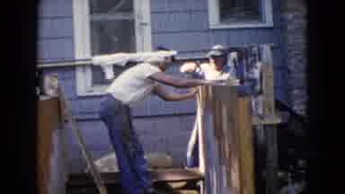 Wauconda Illinois USA (1960): Two People Working On A Construction Project