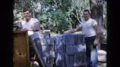 Wauconda Illinois USA (1960): Men In Jeans And White T-Shirts Move Large Rocks By