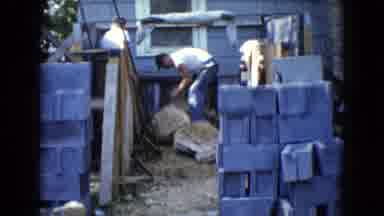 Wauconda Illinois USA (1960): Two Men In The Process Of Removing Cement Blocks In