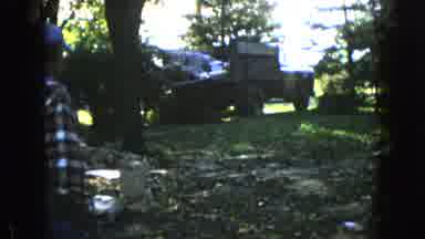 Wauconda Illinois USA (1960): Truck With Supplies Backs Up Into Forested Area