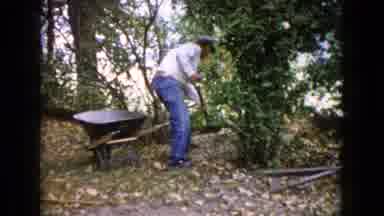 Wauconda Illinois USA (1960): Man Putting Sand On The Cart In The Middle Of A