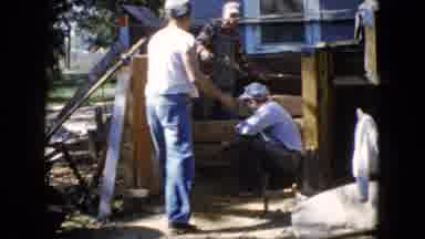 Wauconda Illinois USA (1960): Three Men Working Outside To Rebuild A Deck On A