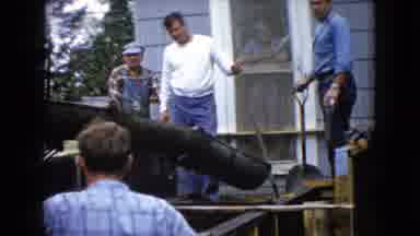 Wauconda Illinois USA (1960): People Discussing In Front Of A Concrete Truck Tube