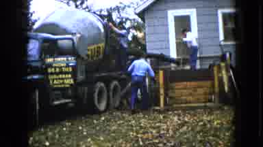Wauconda Illinois USA (1960): Men Working On Pouring Concrete For A Porch To A