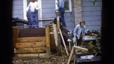 Wauconda Illinois USA (1960): The Workers Are Chopping Wood In The Middle Of The