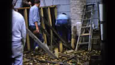 Wauconda Illinois USA (1960): Workers Working On A Deck And A Man Picking Up Stuff